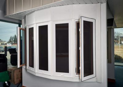 Gill-Windows-showroom-bow-window-with-casement-exterior-open